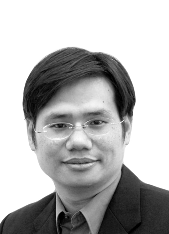 This is a grayscale portrait of Dr. Ho. He is looking towards the camera against a light background.